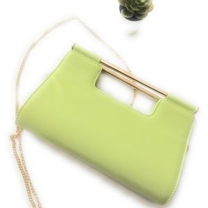 Neon lime green clutch bag by Call it Spring